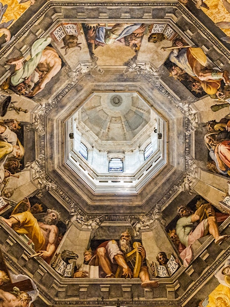 Artwork inside the dome of the Duomo in Florence, Italy, depicting religious figures and scenes.