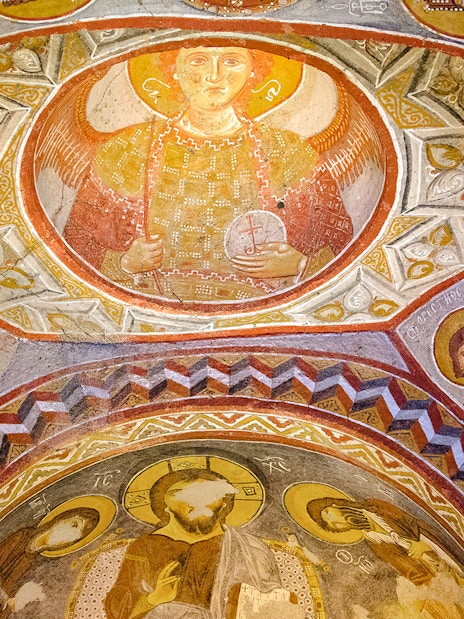 Frescoes depicting religious figures inside a church at Goreme Open Air Museum, Cappadocia.