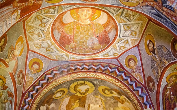 Frescoes depicting religious figures inside a church at Goreme Open Air Museum, Cappadocia.