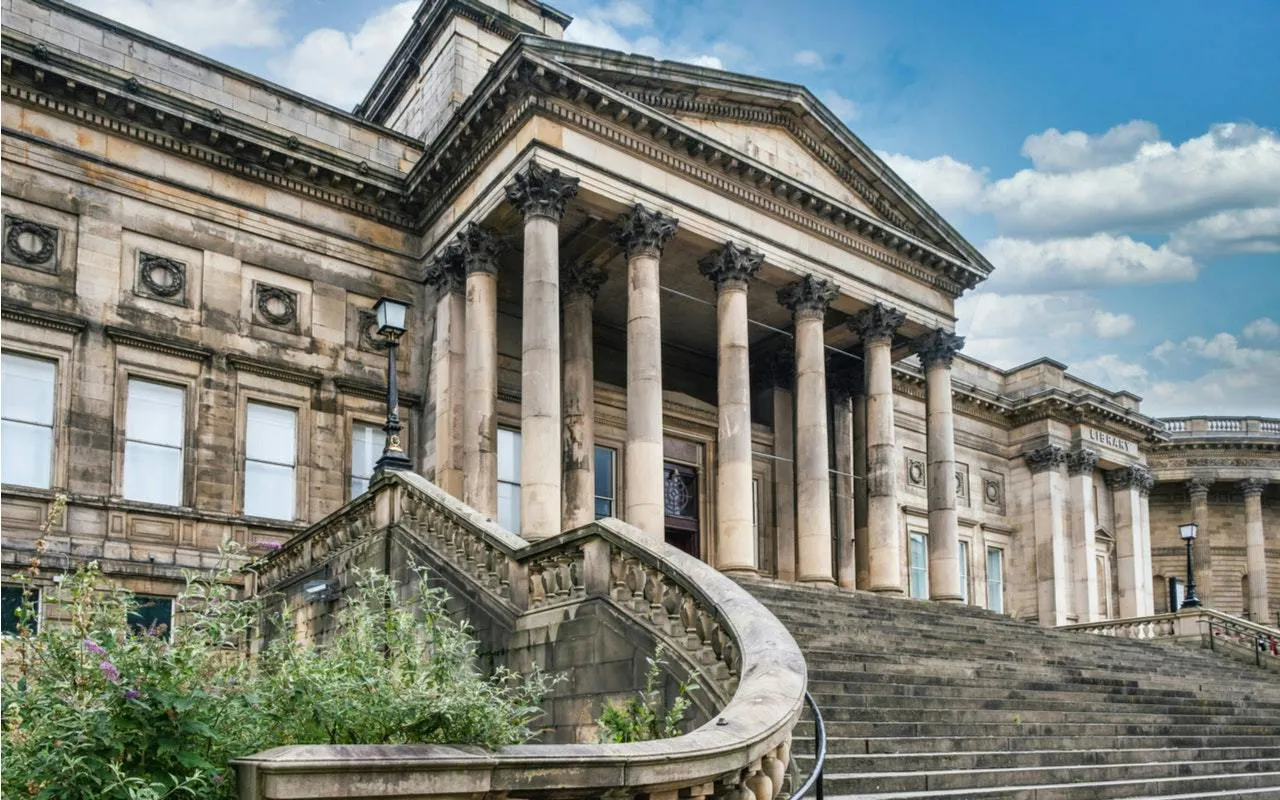 St. George's Hall neoclassical facade with columns, Liverpool exploration game.