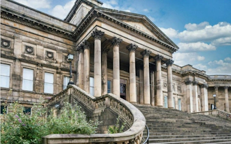 St. George's Hall neoclassical facade with columns, Liverpool exploration game.