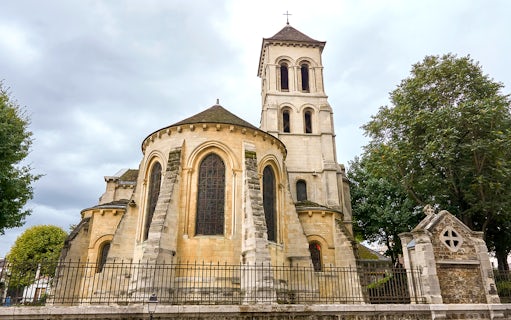 Montmartre church exterior in Paris, part of Montmartrain & Seine River Cruise tour.