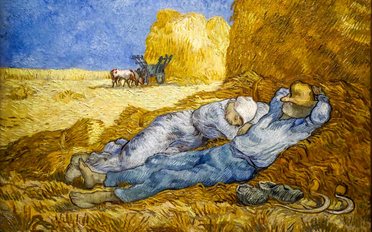 Two figures resting on haystacks in a field, with a cart and oxen in the background, from Van Gogh's work.