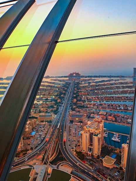 View of The Palm Jumeirah from Burj Khalifa At The Top, showcasing the iconic island layout.