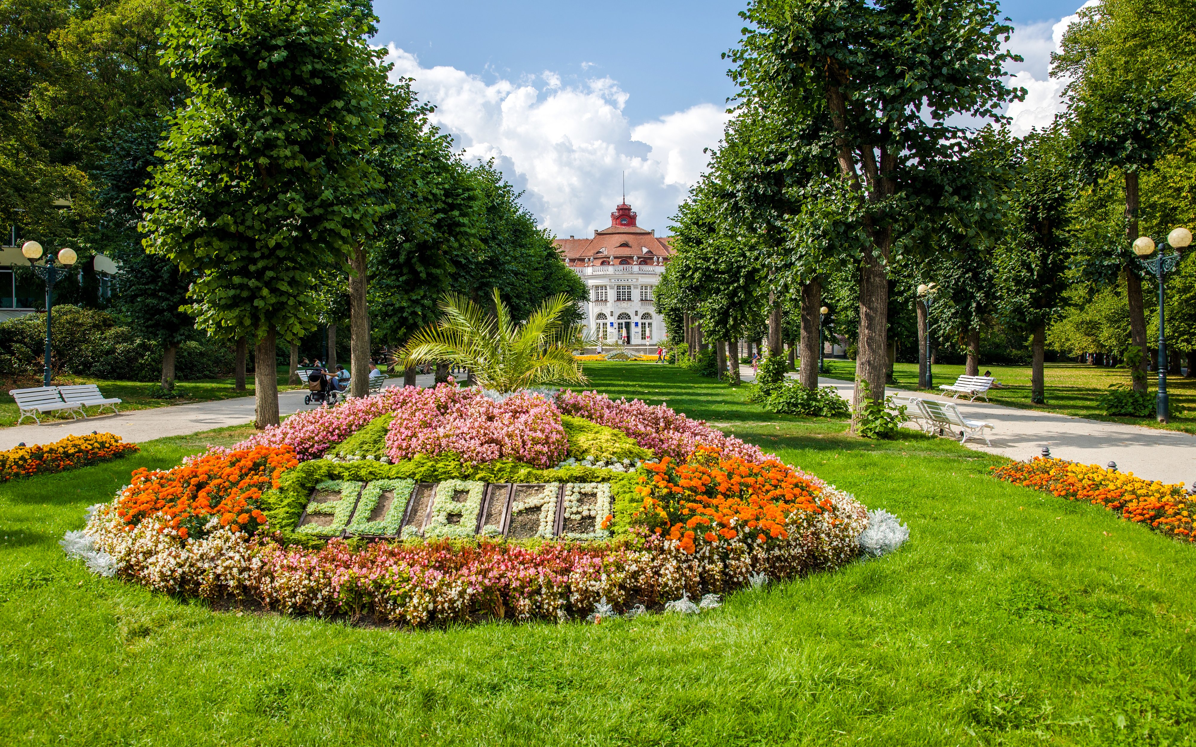 Flower clock and pathway in Smetana Gardens, Karlovy Vary, Prague.