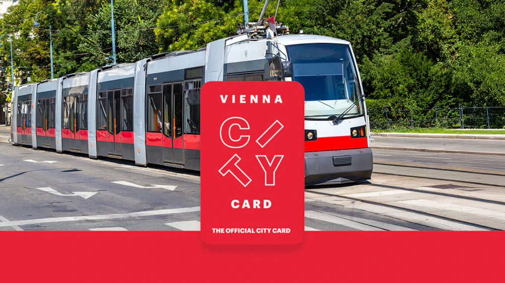 Tram in Vienna with Vienna City Card logo for unlimited transport and discounts.