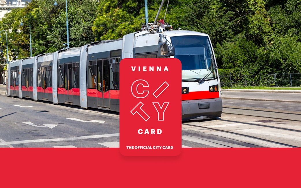 Tram in Vienna with Vienna City Card logo for unlimited transport and discounts.