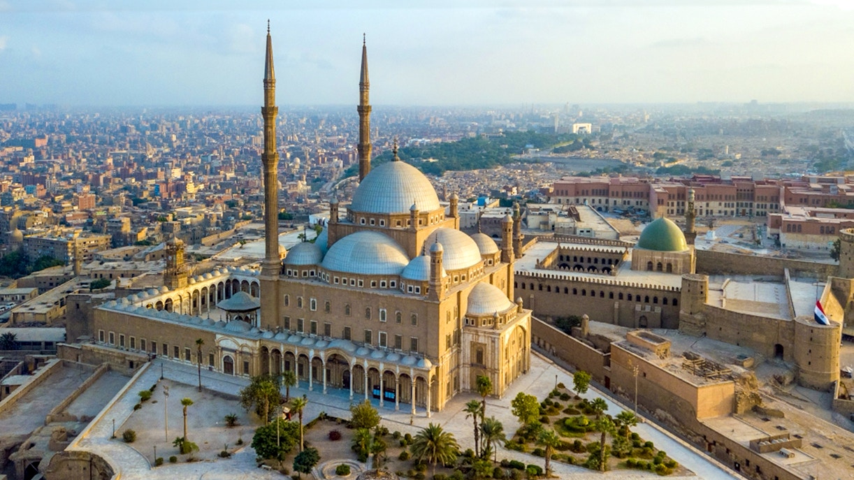 Saladin Citadel in Cairo with cityscape in the background.