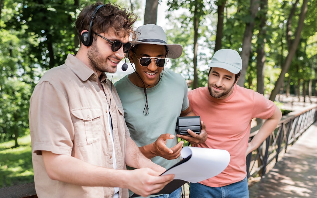 Tourists with guide discussing itinerary during Pocitelj day trip from Split.