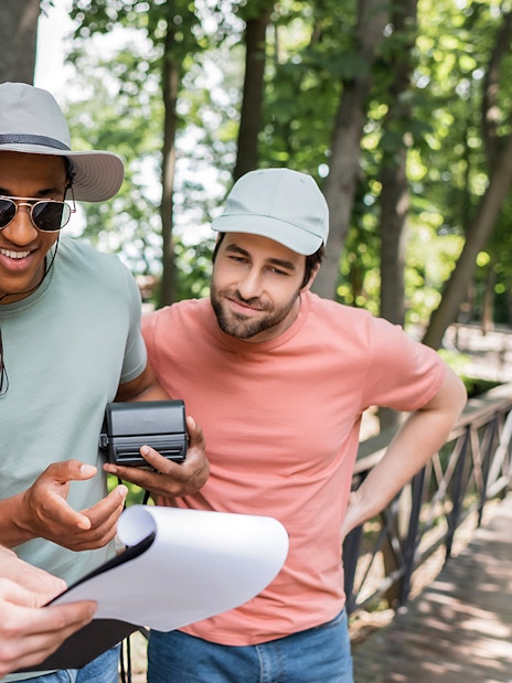 Tourists with guide discussing itinerary during Pocitelj day trip from Split.