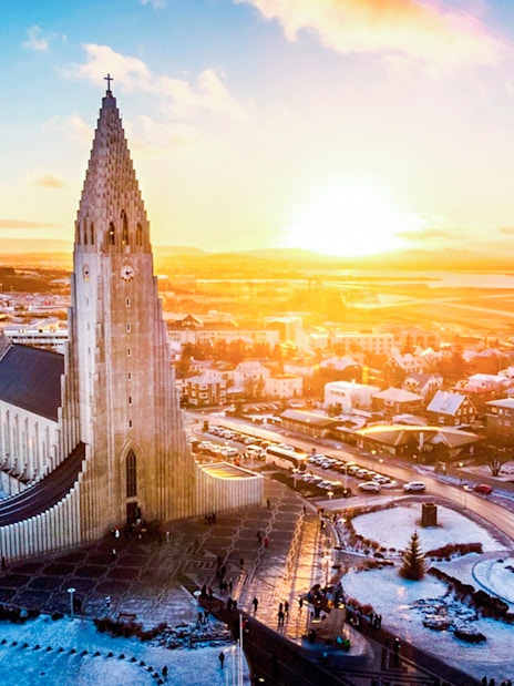 Hallgrímskirkja church in Reykjavik at sunrise, showcasing Iceland's architectural wonder.