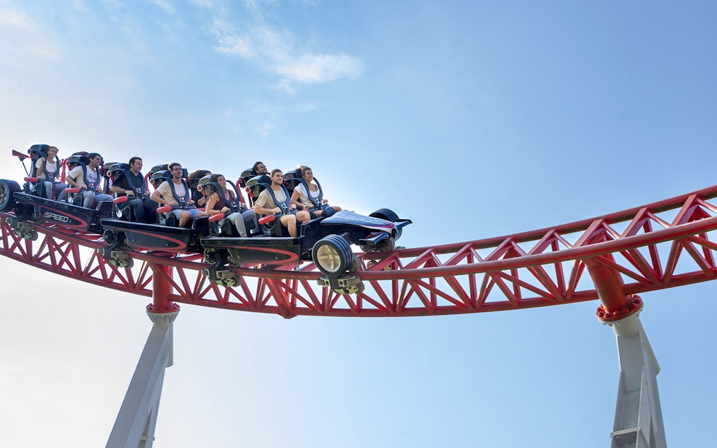 Roller coaster ride at Mirabilandia Park, Ravenna, with passengers enjoying the thrill.