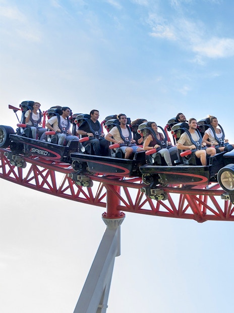 Roller coaster ride at Mirabilandia Park, Ravenna, with passengers enjoying the thrill.