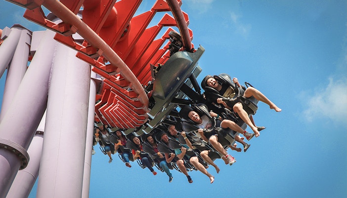 Vortex water ride at Siam Amazing Park, Bangkok, with people enjoying the thrilling twists and turns.