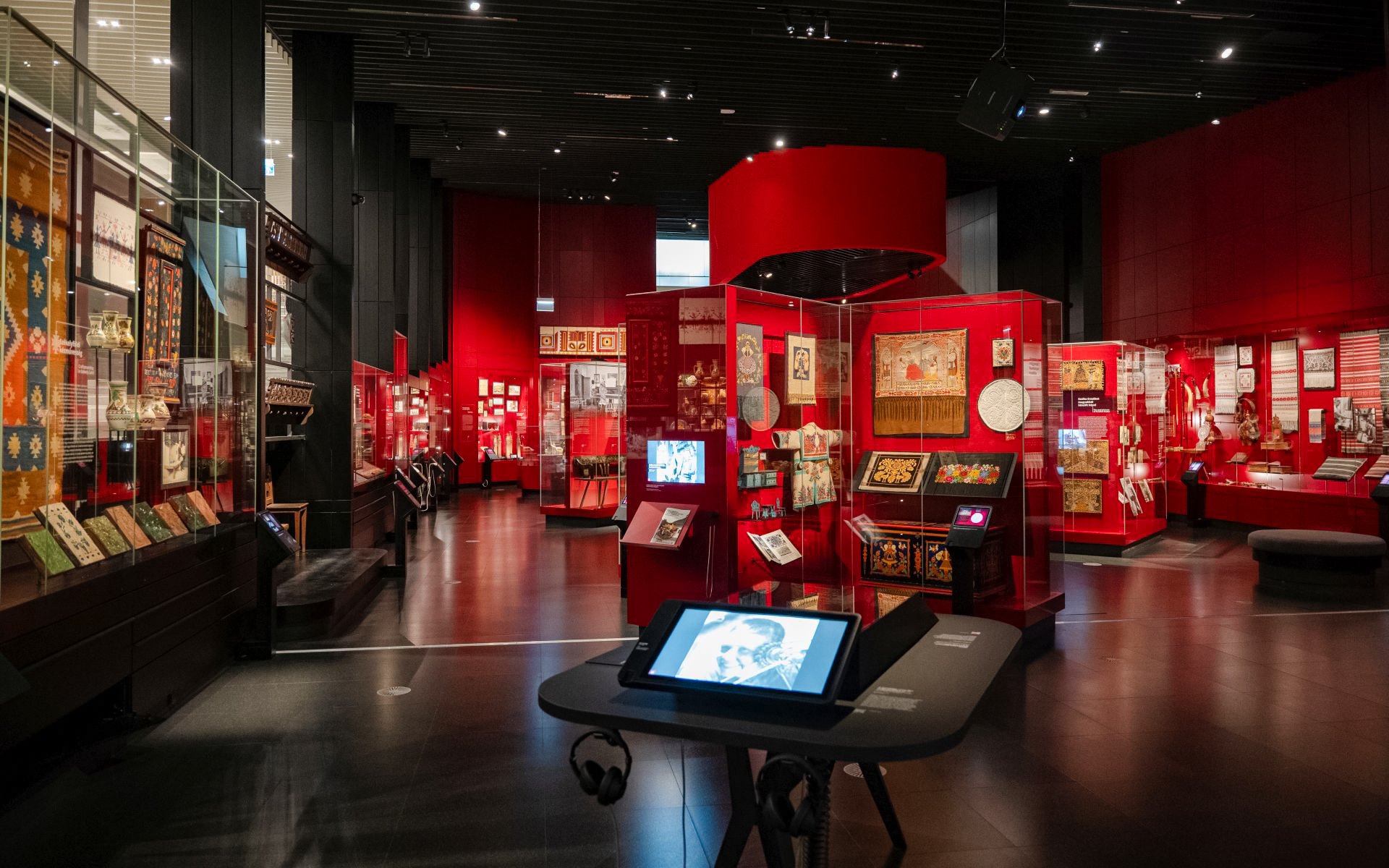Exhibits in the Museum of Ethnography, Budapest showcasing traditional artifacts and textiles.