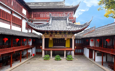 Yu Garden traditional Chinese architecture with red lanterns, Shanghai, China.