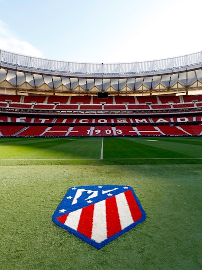 Civitas Metropolitano Stadium field view, Madrid, with Atlético de Madrid logo.