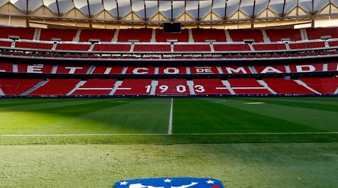 Civitas Metropolitano Stadium field view, Madrid, with Atlético de Madrid logo.