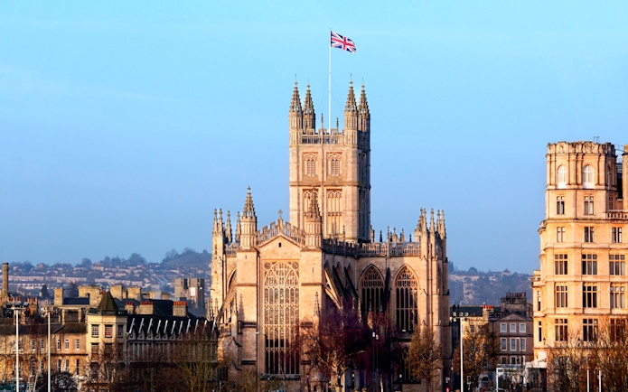 Bath Abbey with Union Jack flag, Bath, England.