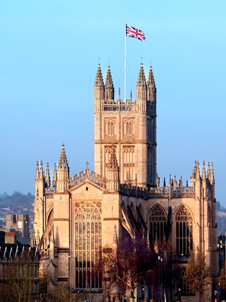 Bath Abbey with Union Jack flag, Bath, England.