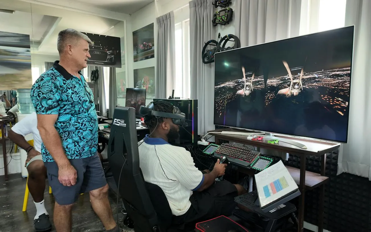 Man using flight simulator at SIMPRO Academy Phuket during a one-hour introductory session.