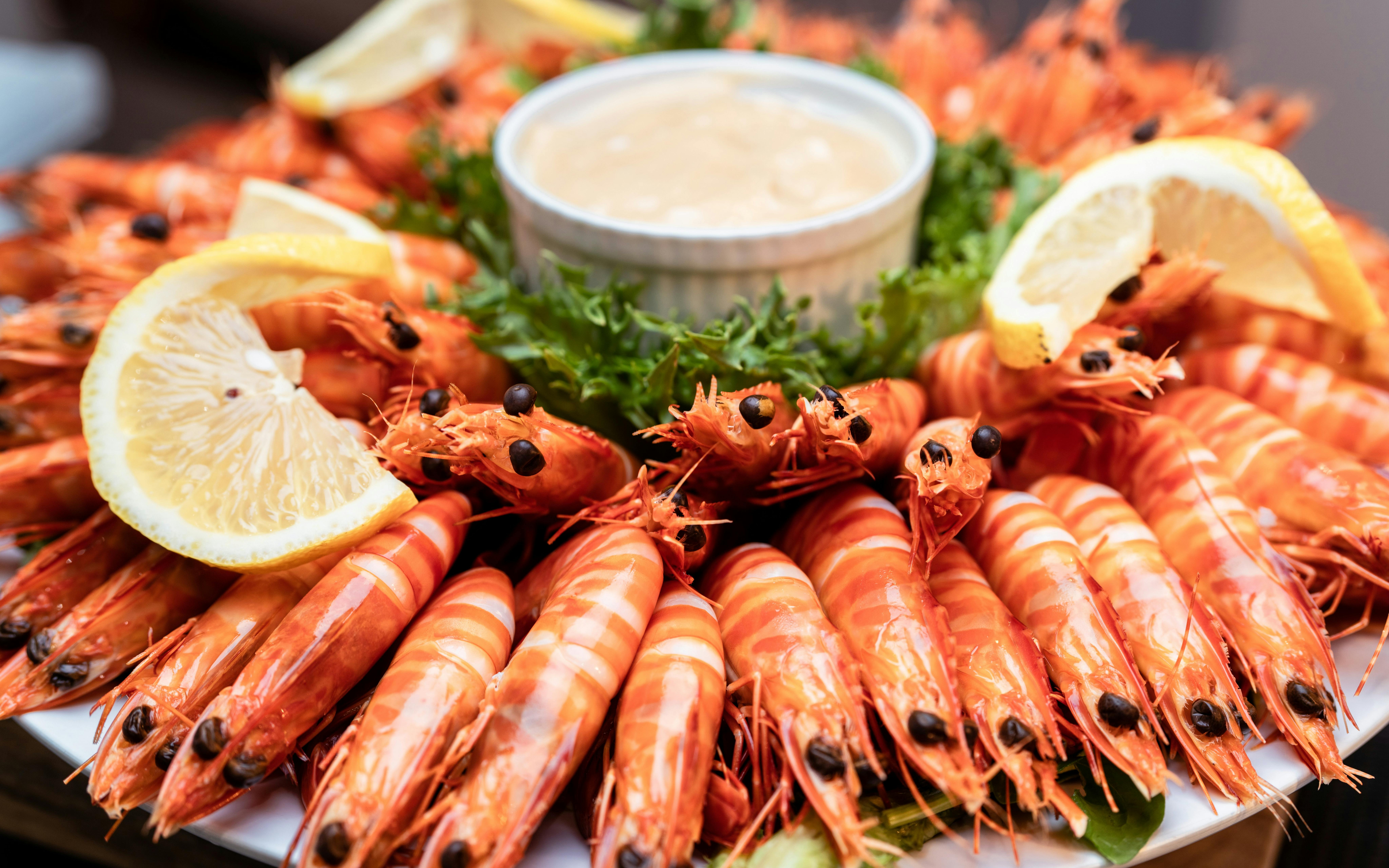 Prawns with lemon wedges and sauce on Darwin Harbour Sunset Dinner Cruise.
