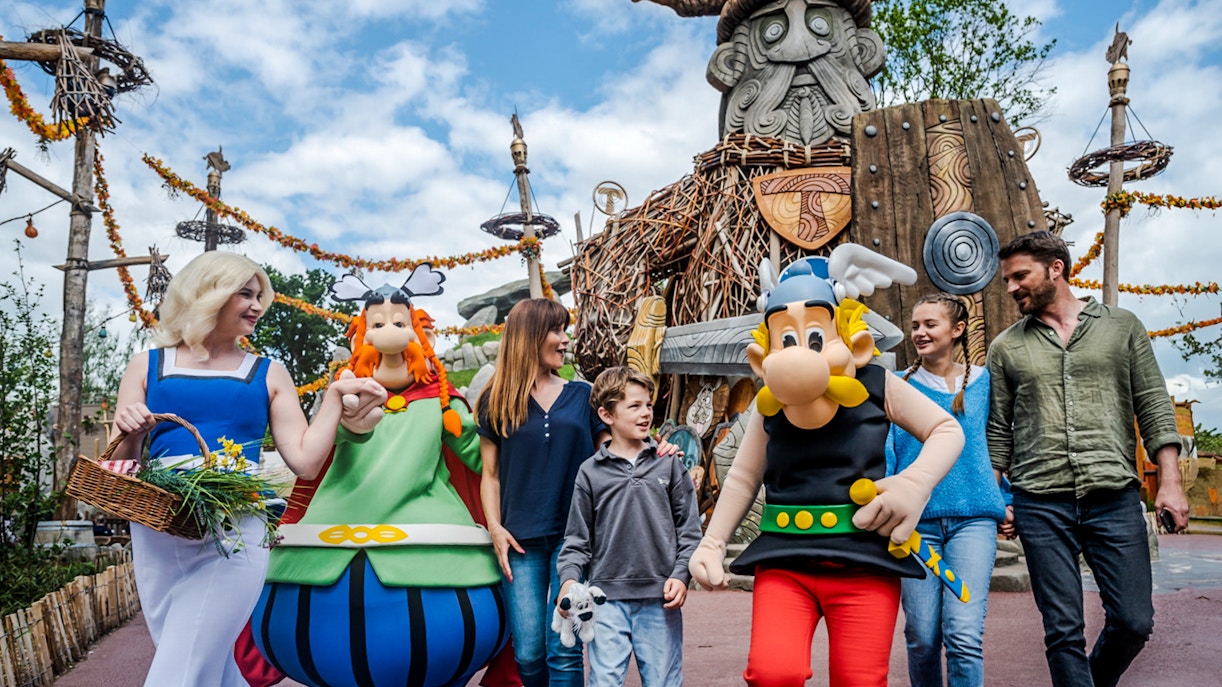 Group of characters from Parc Asterix in France entertaining tourists during a live show