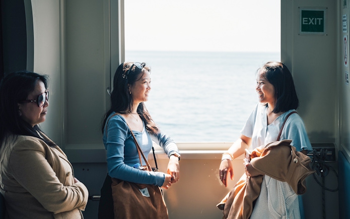 Participants enjoying a boat ride on a day trip in Cinque Terre from Florence.