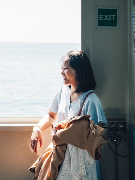 Participants enjoying a boat ride on a day trip in Cinque Terre from Florence.