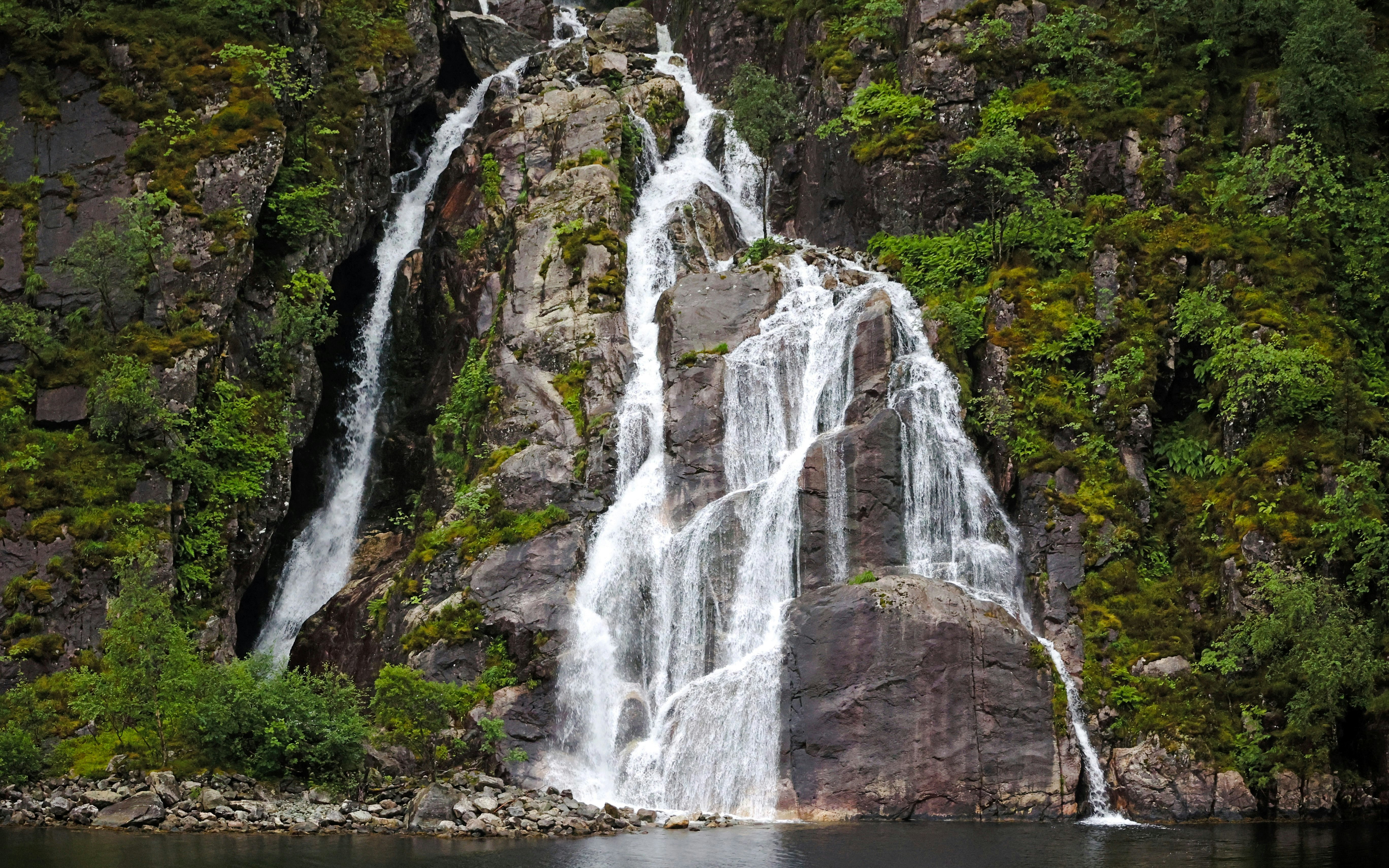 Hengjanefossen waterfall cascading down rocky cliffs, Stavanger, Norway.