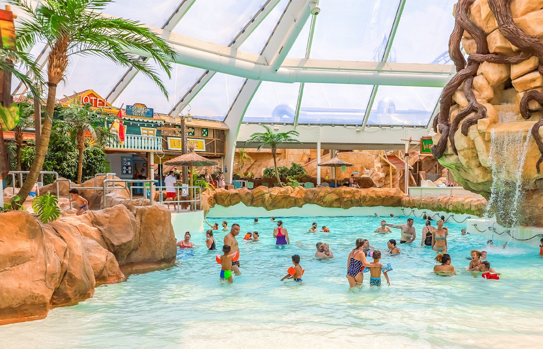 Tourists relaxing in the Aqualibi pool at Walibi Belgium.