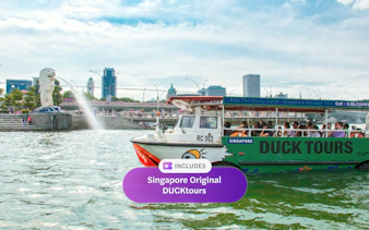DUCKtours boat near Merlion Park in Singapore with city skyline in background.