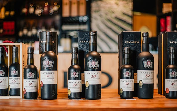 Taylor's Port wine bottles displayed at the Wine Shop & Tasting Room.
