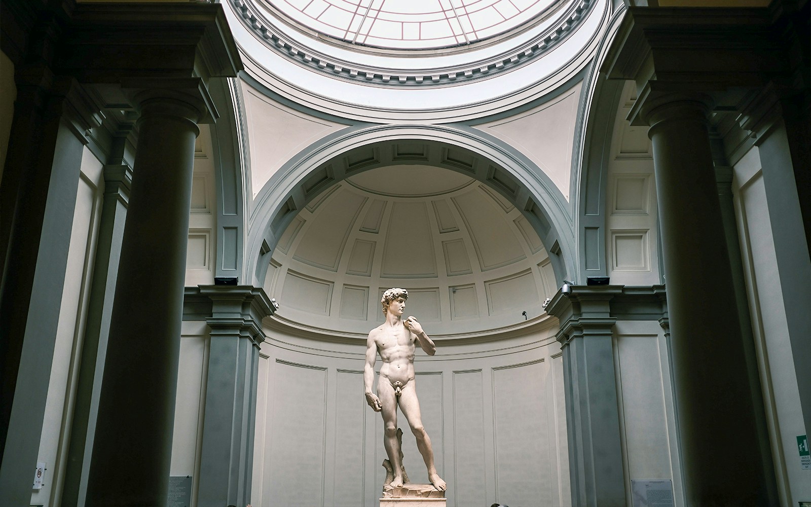 Statue of David in Florence, Italy, showcasing Renaissance art and Michelangelo's craftsmanship.