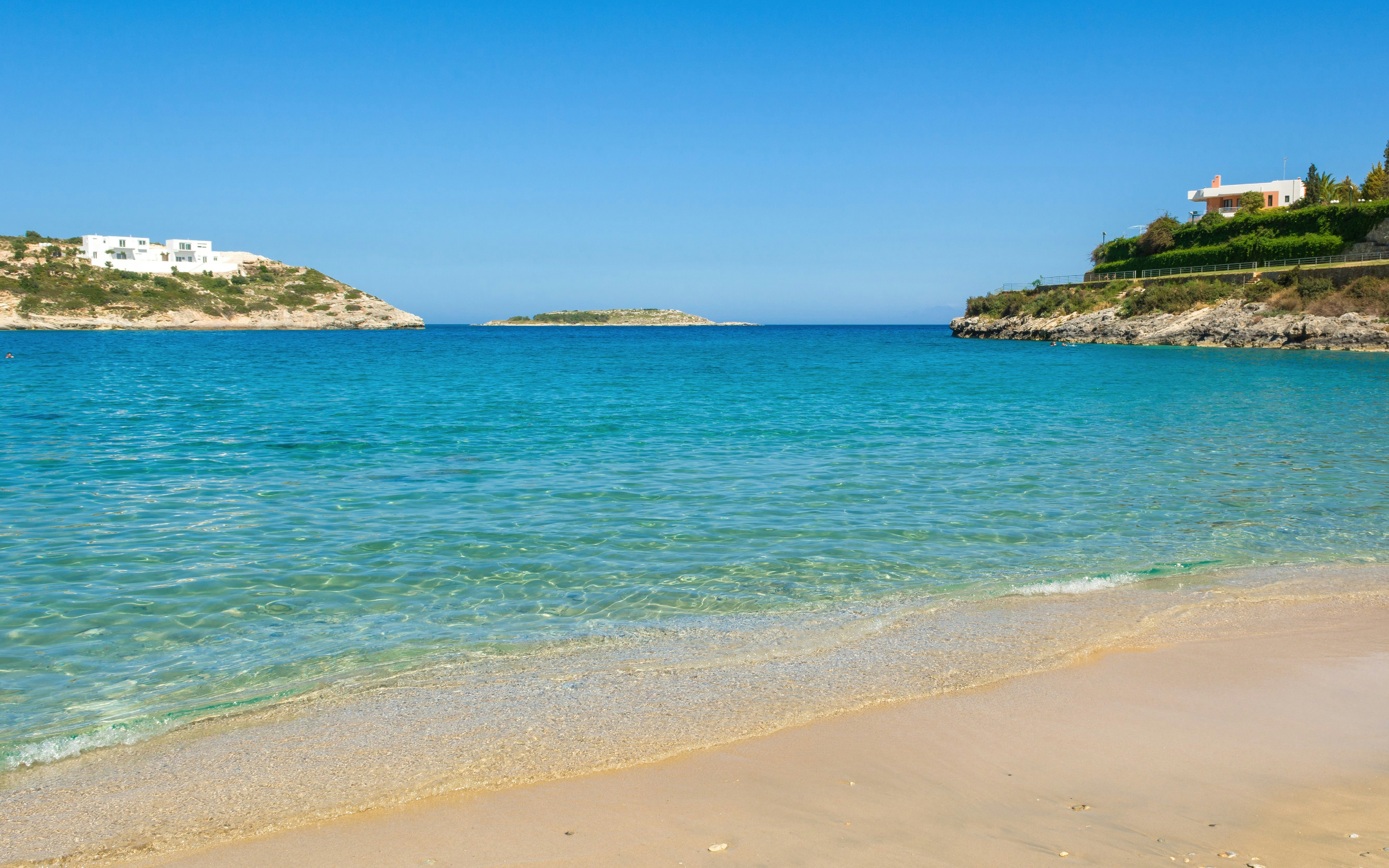 Marathi beach with clear blue water and sandy shore, Crete island, Greece.