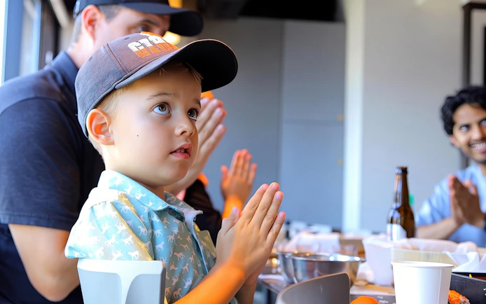Child participating in sushi making class in Asakusa, Tokyo.