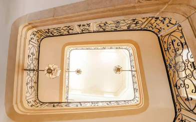Wrought iron staircase at Caumont Centre d’Art in Aix-en-Provence.