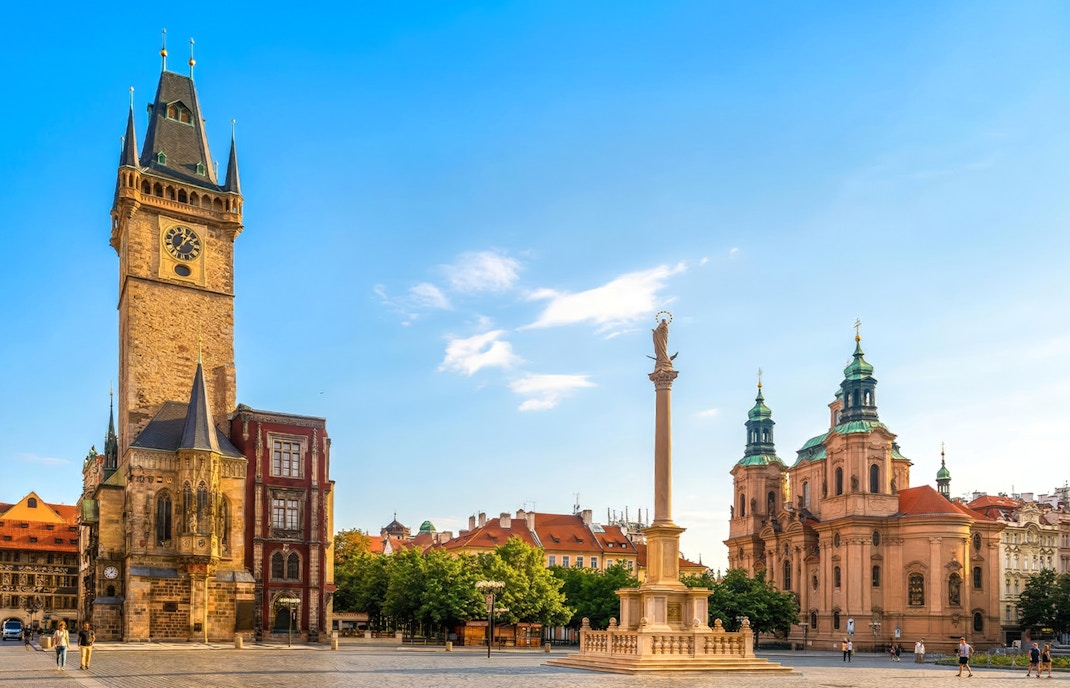 Astronomical Clock Tower and St. Nicholas Church in Old Town Square, Prague.