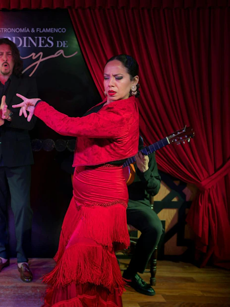 Flamenco dancers performing at Tablao Jardines de Zoraya in Granada, Spain.