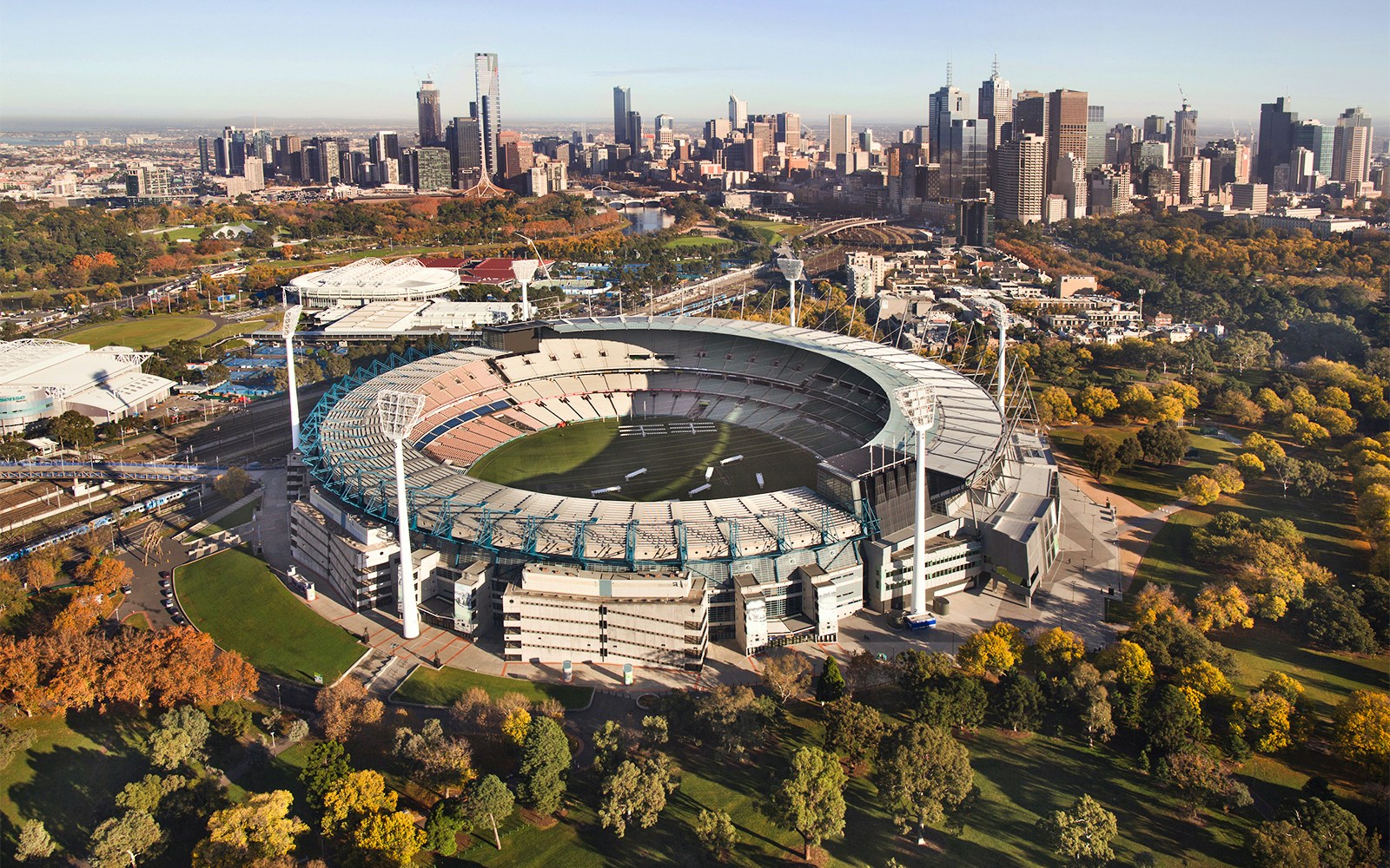 Melbourne Cricket Ground exterior with guided tour group.