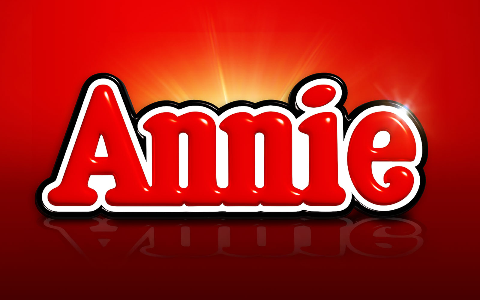 Annie musical logo with red background, Brisbane show promotion