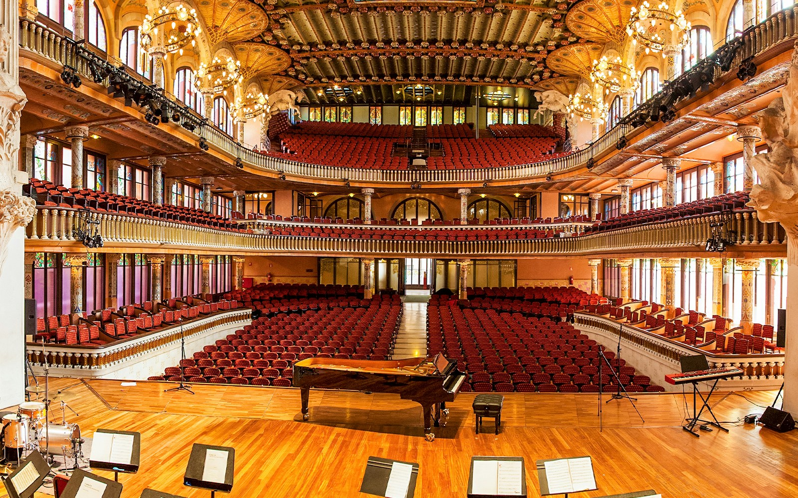 Palau de la Musica Catalana interior with ornate balconies and stage in Barcelona.