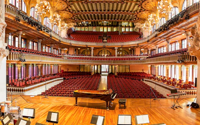 Palau de la Musica Catalana interior with ornate balconies and stage in Barcelona.