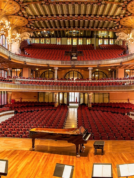 Palau de la Musica Catalana interior with ornate balconies and stage in Barcelona.