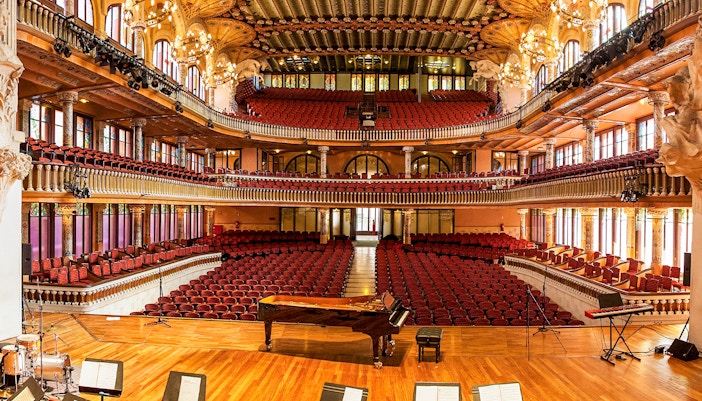 Palau de la Musica Catalana interior with ornate balconies and stage in Barcelona.