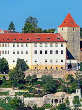 Lobkowicz Palace at Prague Castle with red roofs and historic architecture.