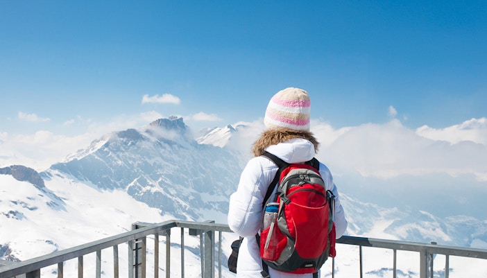 woman enjoying Panoramic View from the top of mount Titlis