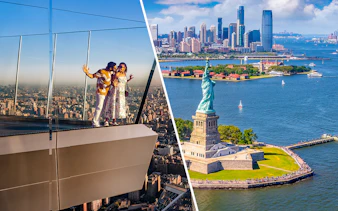Couple enjoying view at Edge Observation Deck, New York City skyline; Statue of Liberty with ferry.