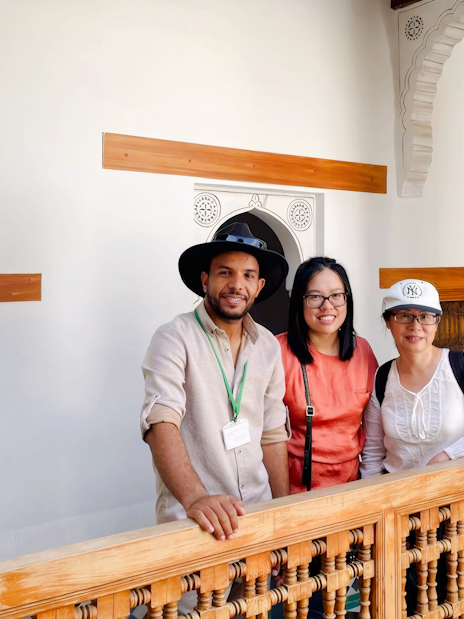 People with guide at Madrasa Ben Youssef, Marrakesh.
