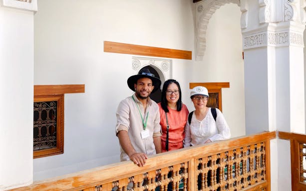 People with guide at Madrasa Ben Youssef, Marrakesh.